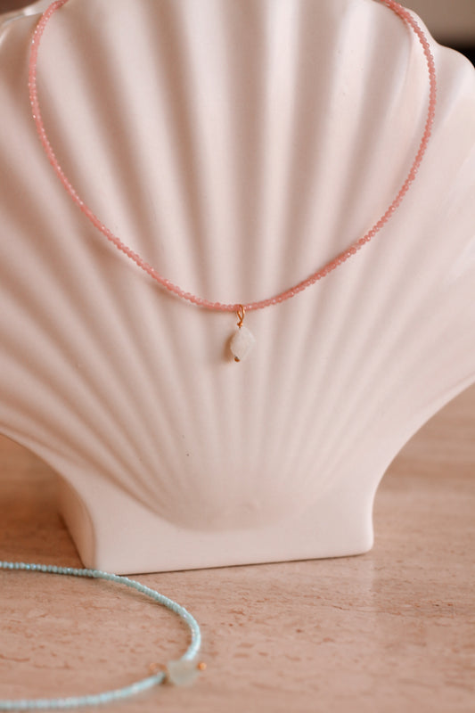 Kristal ketting roze rond schelp