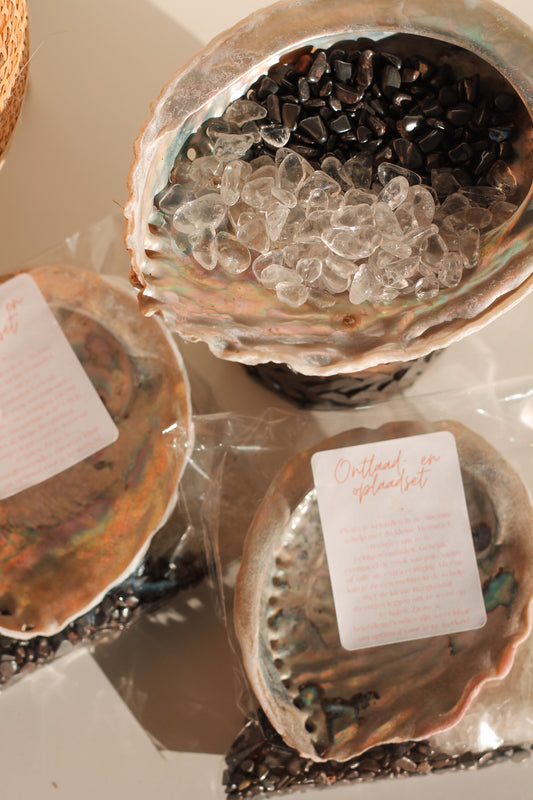 Kristallen ontlaad- en oplaadset met abalone schelp