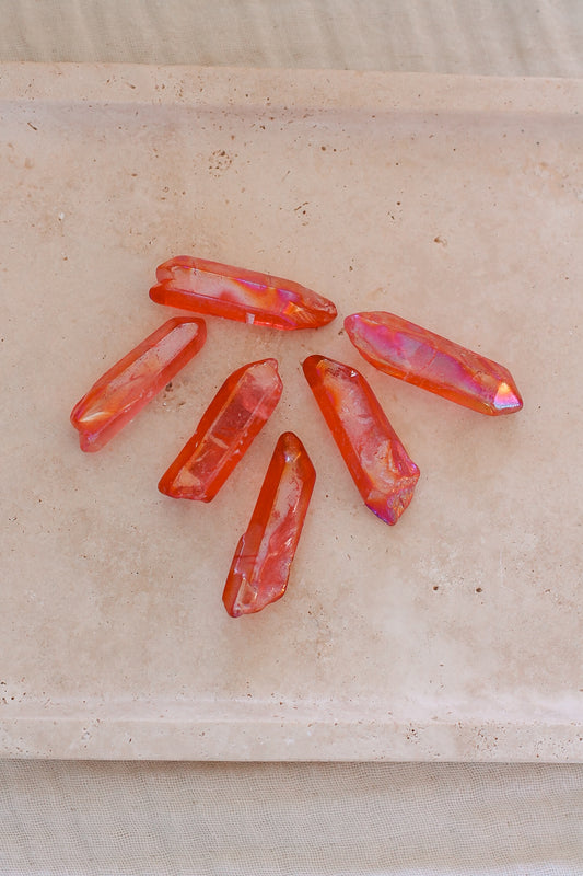 Unieke Rode Aura puntjes met diepe, warme kleur die helpt bij aarding, zelfvertrouwen en het versterken van de wortelchakra.